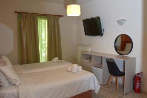 TV a/nebo společenská místnost v ubytování Centroom Suites + 36 fotografií