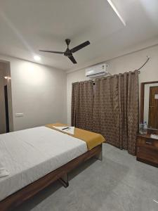 Katil atau katil-katil dalam bilik di Vele's Homestay