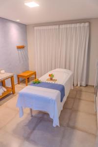 Postel nebo postele na pokoji v ubytování Matiz Igaratá Resort, Spa e Eventos