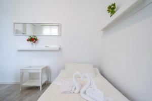 Cama o camas de una habitación en Duomo 15' - Suite 5' from Station with Wifi and A-C