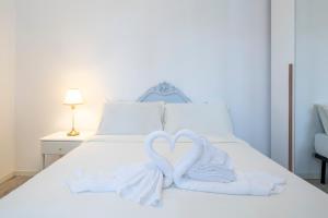 Cama o camas de una habitación en Duomo 15' - Suite 5' from Station with Wifi and A-C