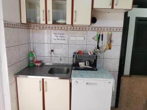 Kuchyň nebo kuchyňský kout v ubytování Stars Aspava Blue HOSTEL