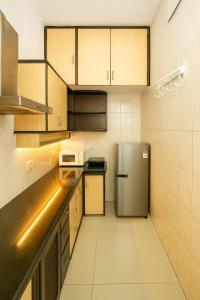 Ảnh trong thư viện ảnh của Nivaasa Apt by JadeCapsNr Taj BengalACWIFI ở Kolkata