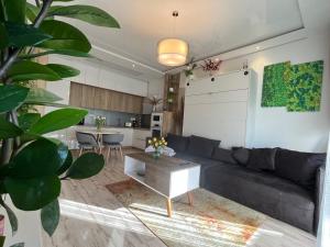 Kuchyňa alebo kuchynka v ubytovaní Cozy apartment