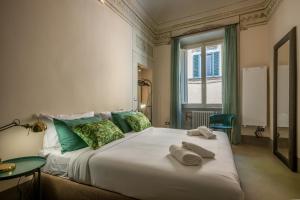 Katil atau katil-katil dalam bilik di Rentwin - Santa Caterina Luxury Apartment