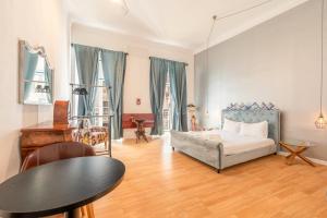 En eller flere senge i et værelse på GuestReady - Boavista homes