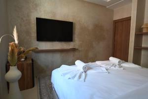 Una cama o camas en una habitación de Suite Atlas - Douceur et confort