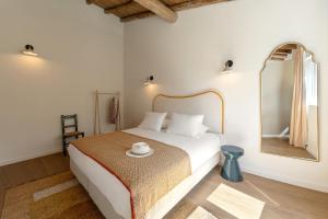 Postel nebo postele na pokoji v ubytování Casa da Rosalina