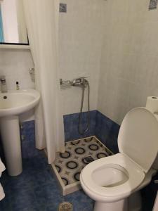 Koupelna v ubytování Hotel L&S lignos