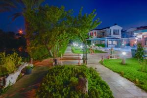 A garden outside Ekinoks Boutique Hotel