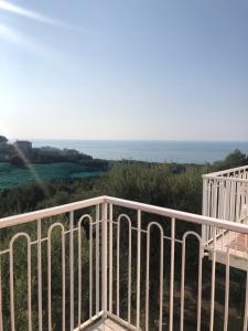 a balcony with a view of the ocean at Hotel Dania in Sorrento