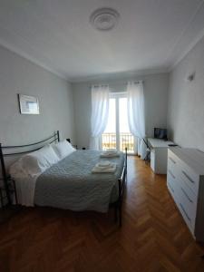 Кровать или кровати в номере La CONCHIGLIA Bed & Breakfast