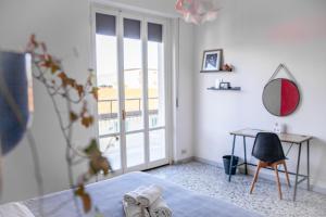 Postel nebo postele na pokoji v ubytování The Homestay - Arezzo + 26 fotografií