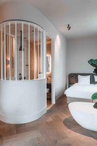 Postel nebo postele na pokoji v ubytování Abdij - Suites