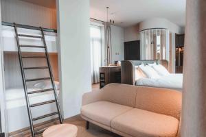 Postel nebo postele na pokoji v ubytování Abdij - Suites