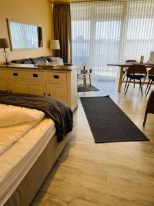 Voodi või voodid majutusasutuse Strandliebe-I-mit-Balkon toas