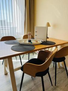 Foto sihtkohas Burgtiefe auf Fehmarn  asuva majutusasutuse Strandliebe-I-mit-Balkon galeriist