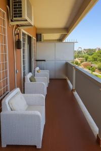 A balcony or terrace at Casa Stazione Magliana