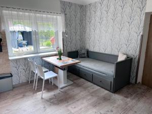 Posedenie v ubytovaní Útulné spaní ve venkovské chaloupce s vířivkou