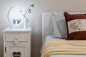 A bed or beds in a room at Rosa dei Venti 2