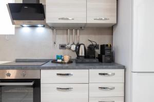 A kitchen or kitchenette at Rosa dei Venti 2