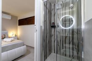 A bed or beds in a room at Rosa dei Venti 2