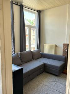 Posezení v ubytování petit appartement Huy centre