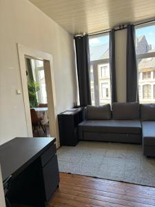 Posezení v ubytování petit appartement Huy centre