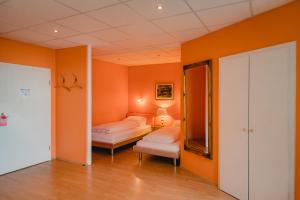 Postel nebo postele na pokoji v ubytování Hotel Stadtresidenz
