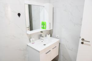Koupelna v ubytování Bizz Apartment