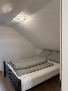 Postel nebo postele na pokoji v ubytování Ferienwohnung für Gruppen oder Familien