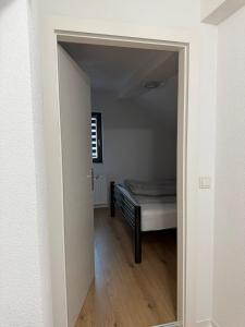Postel nebo postele na pokoji v ubytování Ferienwohnung für Gruppen oder Familien