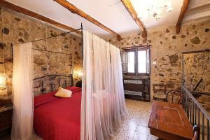 Postel nebo postele na pokoji v ubytování B&B La Voce del Fiume Dimora storica di Charme