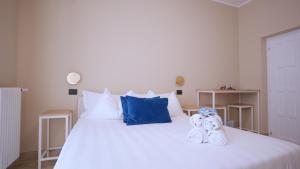 Postel nebo postele na pokoji v ubytování Augusto al Mare