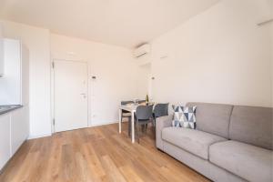 Posezení v ubytování GARDA LIVING APARTMENTS Torbole