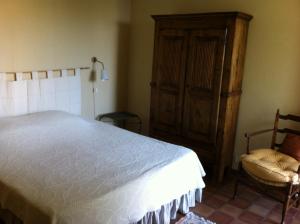Una cama o camas en una habitación de villa cassis vue mer