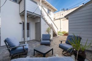 A balcony or terrace at Beachside Apt with Laundry Steps to the Shore