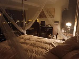Postel nebo postele na pokoji v ubytování B&B La Voce del Fiume Dimora storica di Charme