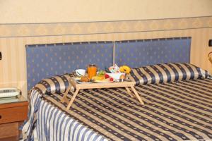 Posteľ alebo postele v izbe v ubytovaní Albergo Ristorante Leon d'Oro