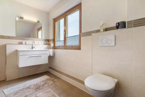 Koupelna v ubytování Haus Herbert Panter + 21 fotografií