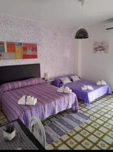 Postel nebo postele na pokoji v ubytování B&B Dolce Casa