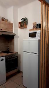 Η κουζίνα ή μικρή κουζίνα στο Terra Corsa Duplex T2