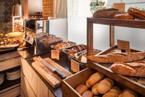 a bakery with many different types of bread on display at Catalonia Málaga in Málaga