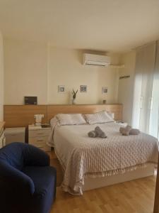 Posteľ alebo postele v izbe v ubytovaní Triplex