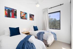 a bedroom with two beds and a window at Comfort & Convenience - A Sepal Stay in Perth