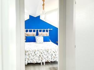 Ένα ή περισσότερα κρεβάτια σε δωμάτιο στο 3B Mondello Apartments