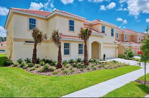 a large house with palm trees in a yard at Spacious King, Queen Rooms in Luxury Villa-Pool-SPA-Disney-WiFi-Smart TV in Davenport