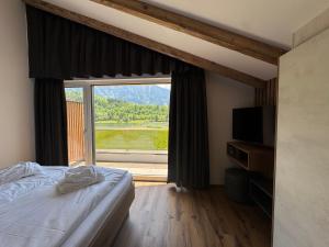 Postel nebo postele na pokoji v ubytování Das Goldjuwel - Luxury Apartments with private Spa