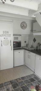 Nhà bếp/bếp nhỏ tại Le Cocon d'altitude