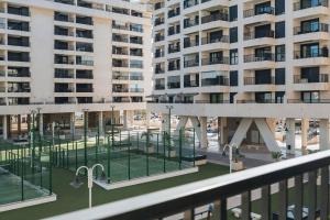 a view from the balcony of a apartment building at White Beach Apartment in Valencia